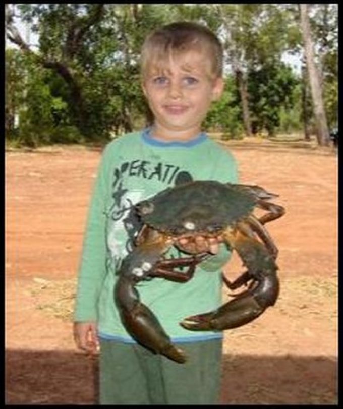 Leaders-Creek-Fishing-Base-Kid-with-Big-Crab.jpg