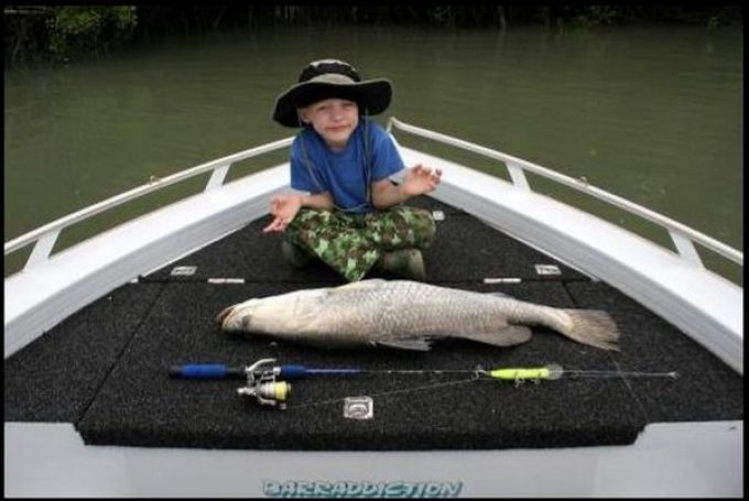 Leaders-Creek-Fishing-Base-Kid-with-Big-Fish.jpg