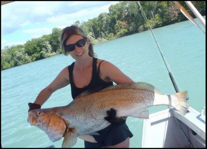 Leaders-Creek-Fishing-Base-Lady-with-Big-Fish.jpg